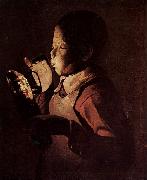 Georges de La Tour Knabe blast in eine Lampe oil painting artist